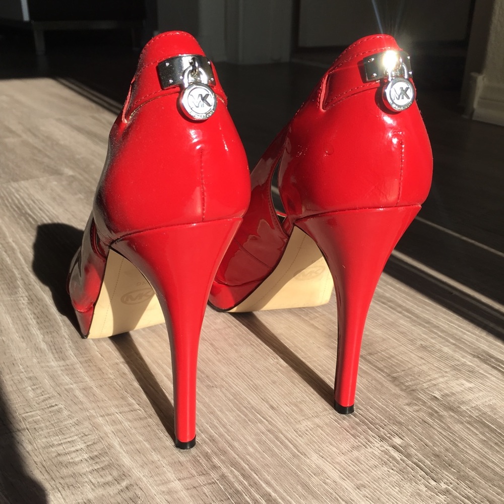 Red MK Pumps